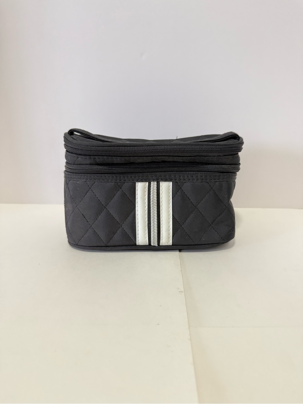 Black Quilted Toiletry Bag with White Stripe Accent